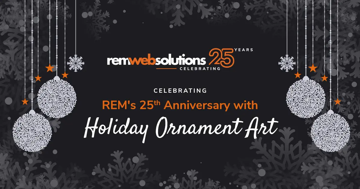 White and orange holiday ornaments on a dark grey background